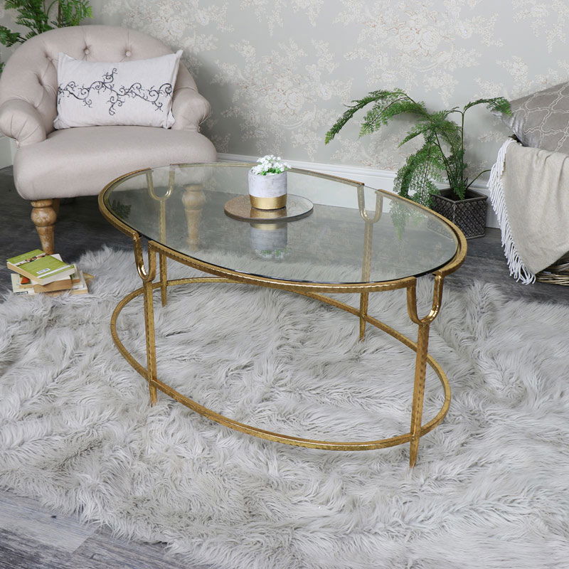 Large Gold Oval Glass Topped Coffee Table