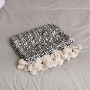 Black and White Pattern Throw with Pom Poms - 130cm x 160cm